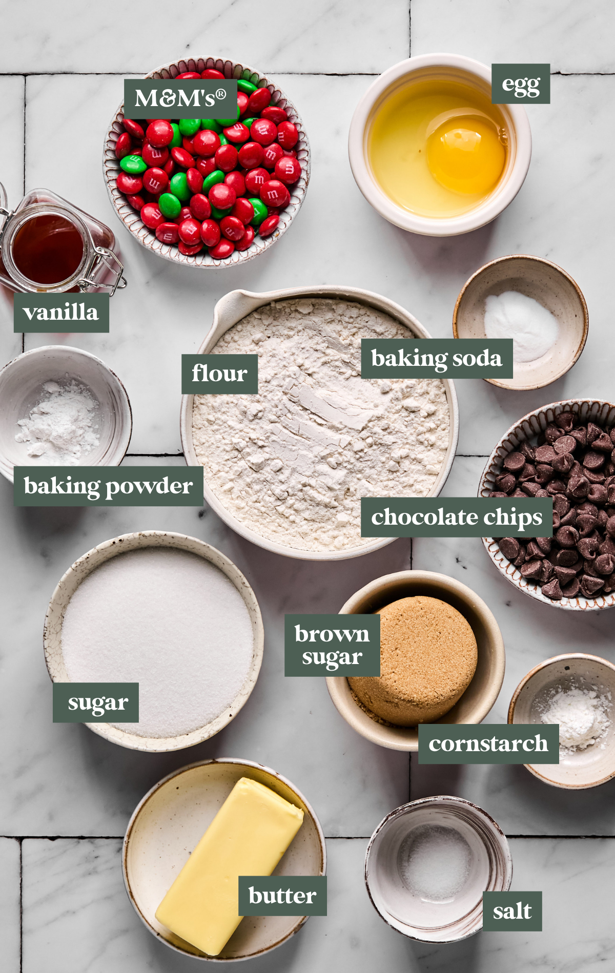 ingredients to make cookies in small glass bowls. 