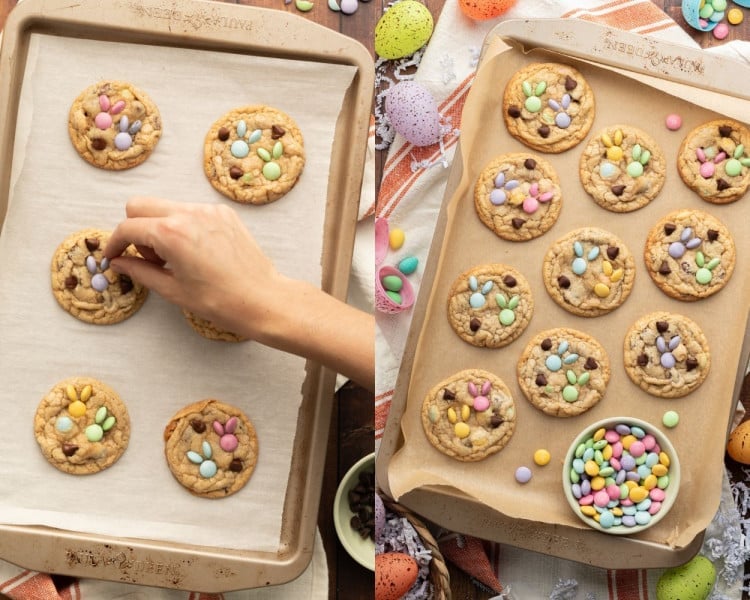 A side-by-side image showing the final stages of decorating and baking cookies. On the left, a person is placing pastel-colored M&Ms onto freshly baked cookies to create bunny designs on a parchment-lined baking sheet. On the right, a full tray of completed cookies with colorful M&M bunny decorations sits on a wooden surface, surrounded by festive Easter decorations, including speckled eggs, a striped dish towel, and a bowl of extra M&Ms.