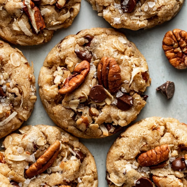 Upclose shot of cowboy cookie with four more cookies surrounding it.