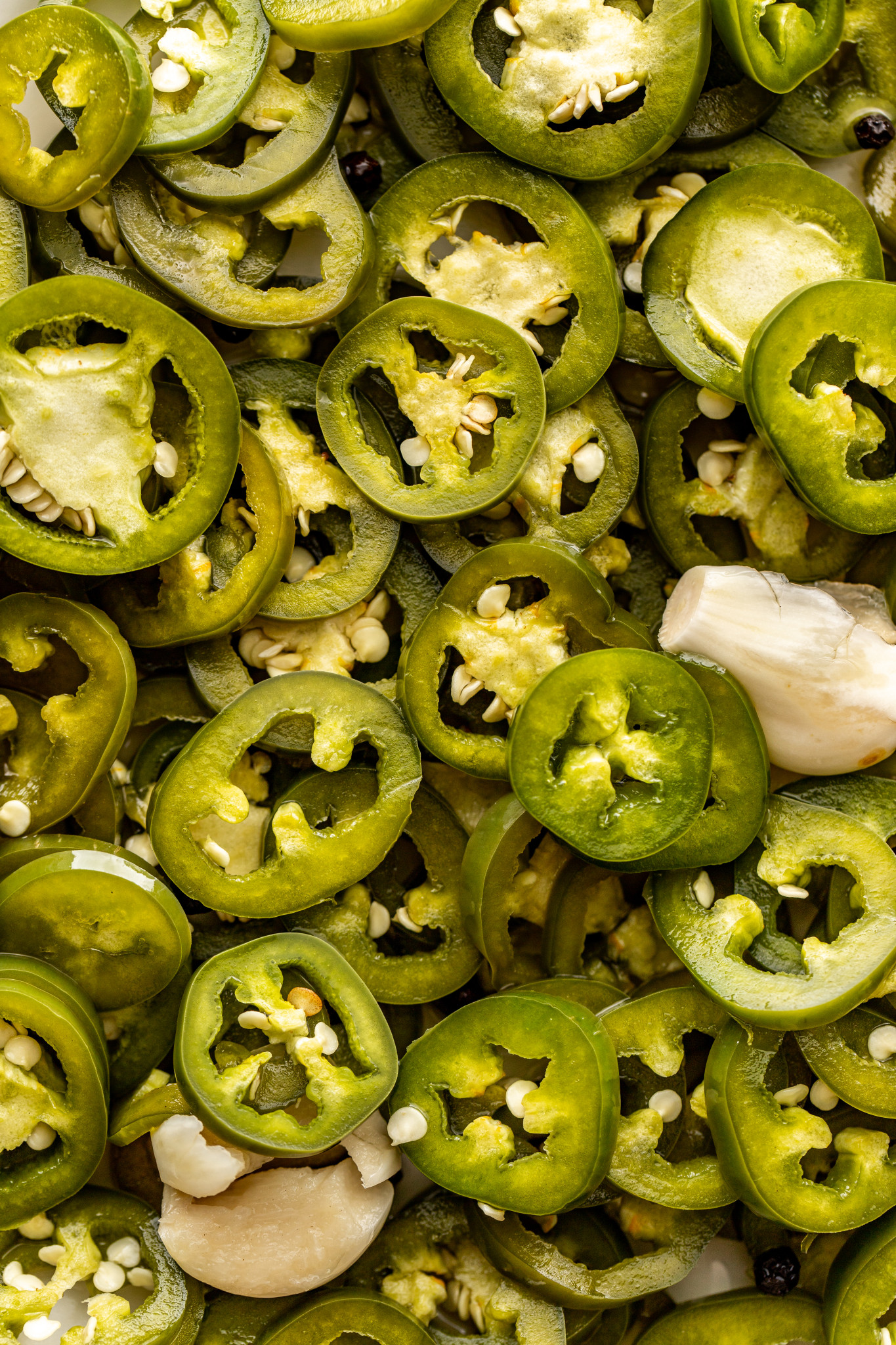 a macro shot image of fresh jalapenos.