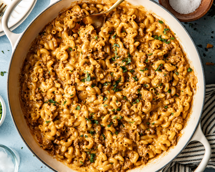 Hamburger macaroni in large pot with fork in the pot.
