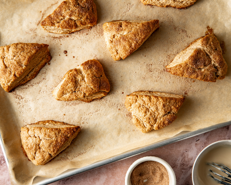 Cinnamon sugar scones on baking tray after baking.