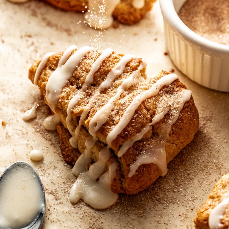 Sprinkle baked scone with cinnamon sugar topping.