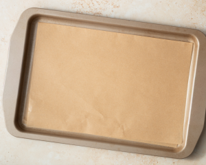 Baking sheet lined with parchment paper.