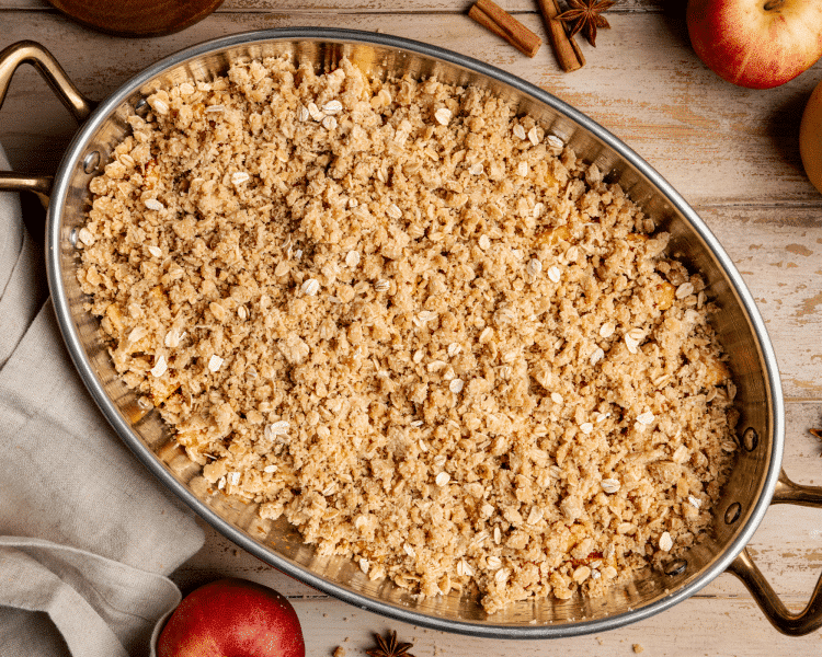 Apple crisp assembled in baking dish before baking.