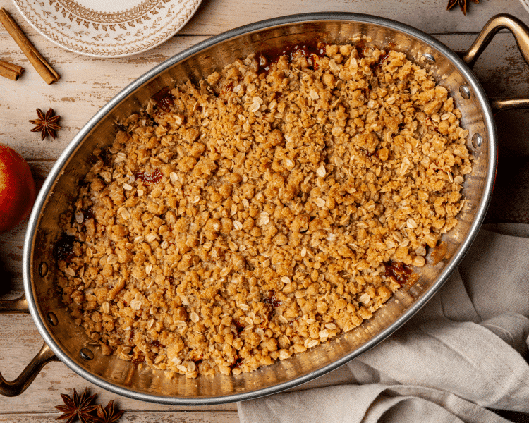 Apple crisp baked in baking dish.
