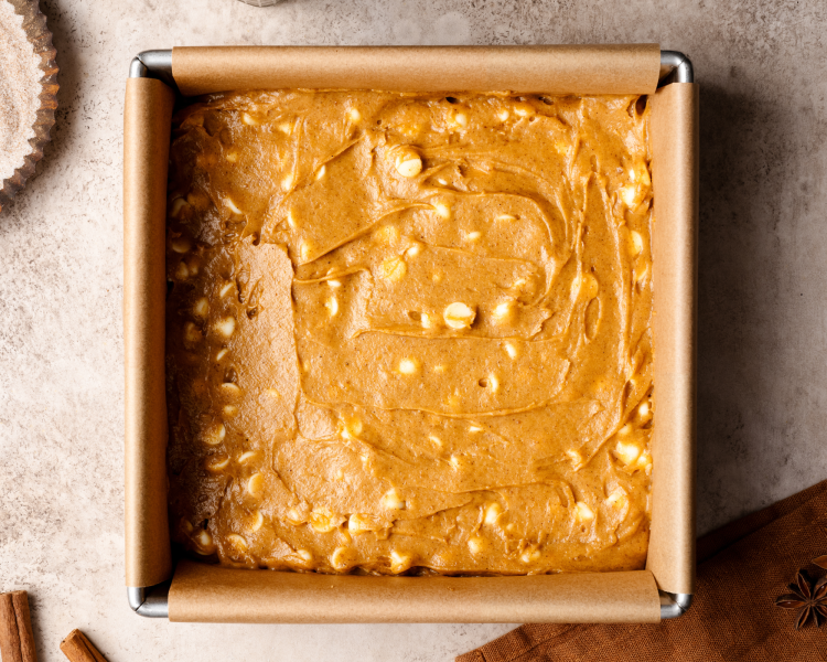 Blondie batter poured in to 8x8-inch pan.