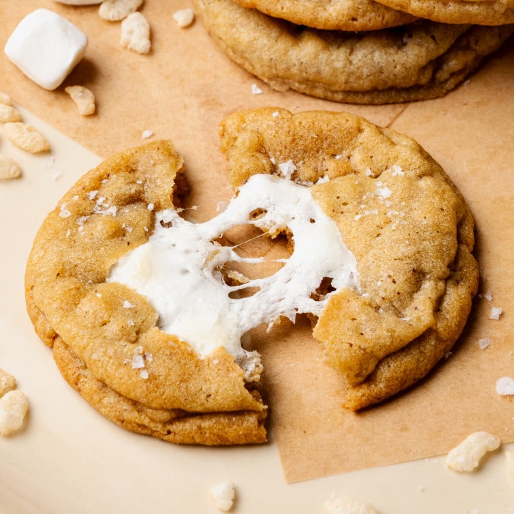 Baked rice krispie cookie cut into two halves.