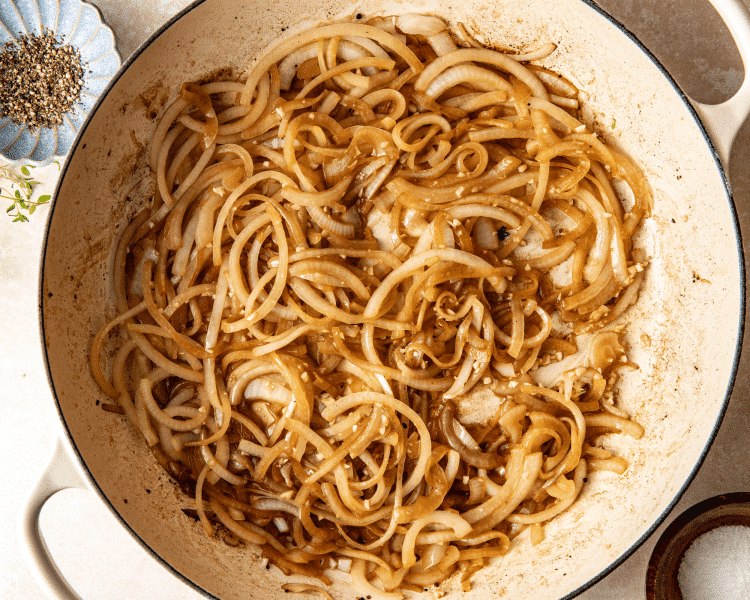 Sautéed onions in a large skillet.