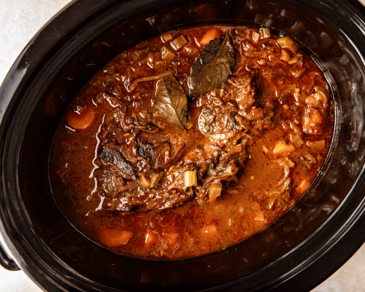 Pot roast cooked in slow cooker on low for 8-10 hours.