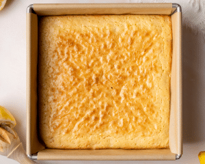 Lemon brownies baked in 8x8 pan.
