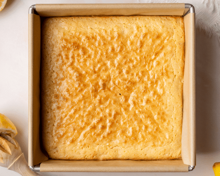 Lemon brownies baked in 8x8 pan.