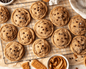 Biscoff cheesecake cookies cooling on wire rack.