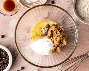 Sugars and melted butter in mixing bowl.