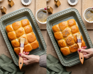 Brushing the topping on top of the rolls before baking.
