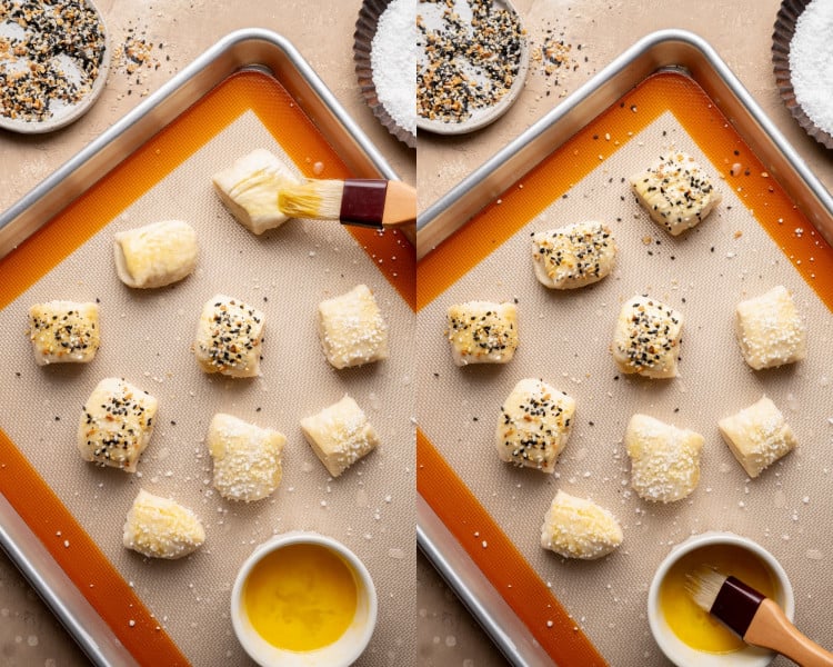Overhead view of pretzel bites brushed with egg wash and topped with pretzel salt and everything bagel seasoning on a silicone-lined baking sheet.