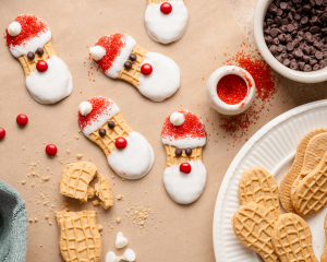 Decorated nutter butter santas.
