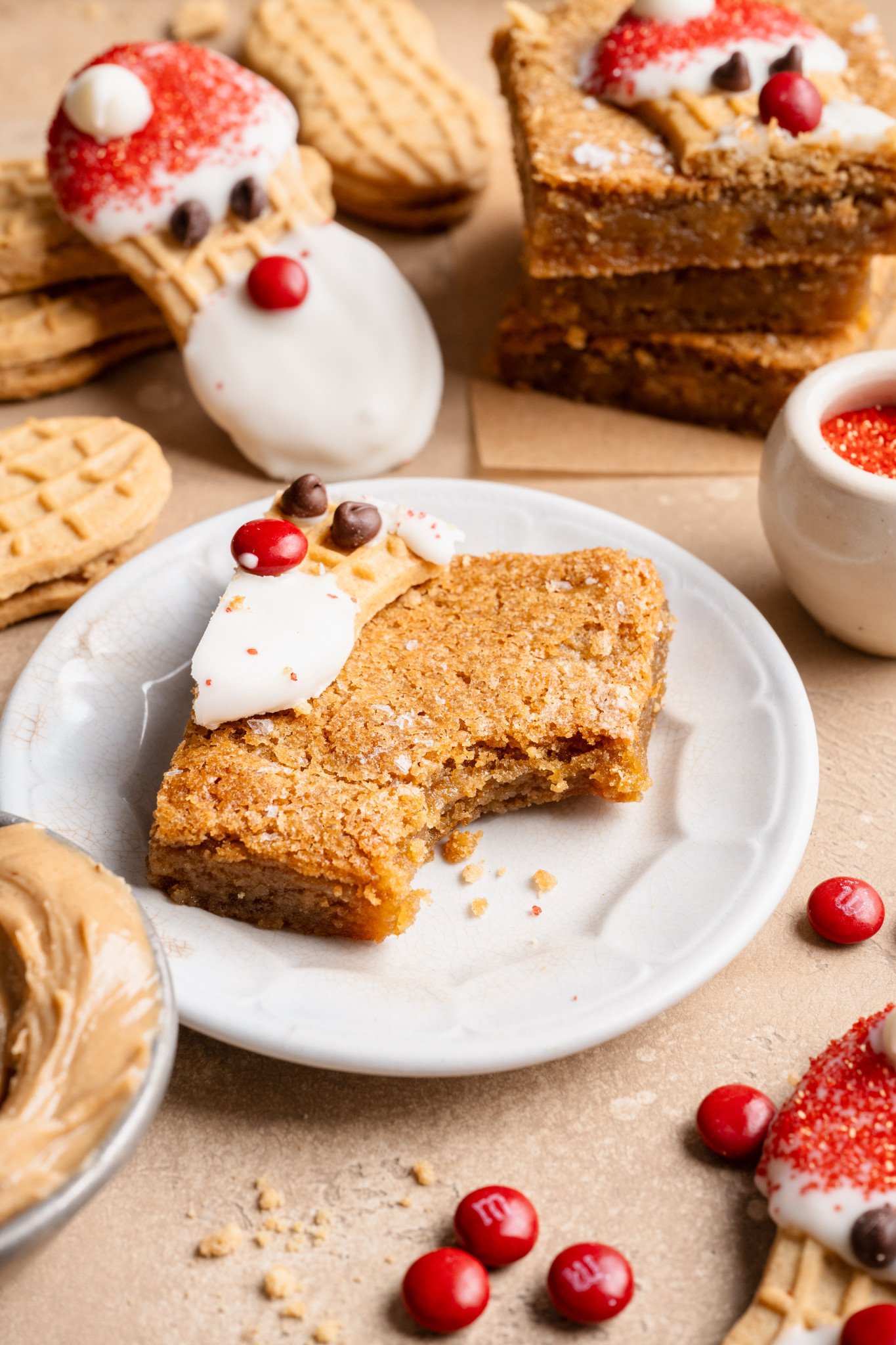 Nutter butter cookie bar on place with bite taken out of the middle.