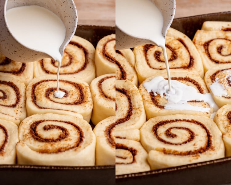 Overhead view of heavy cream being poured over unbaked cinnamon rolls in a baking dish, soaking into the rolls before baking.