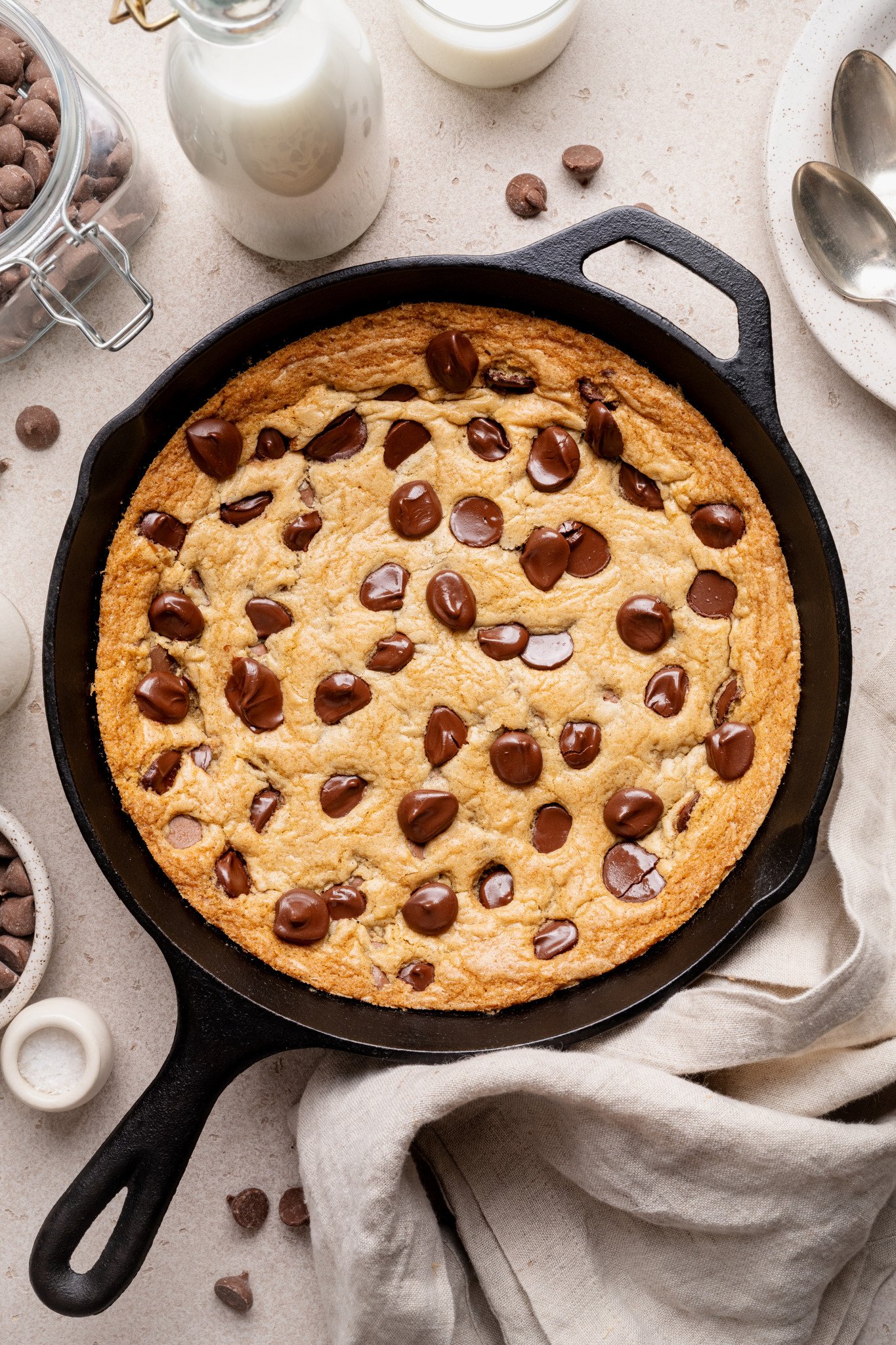 Chocolate chip cookie skillet baked in cast iron skillet.