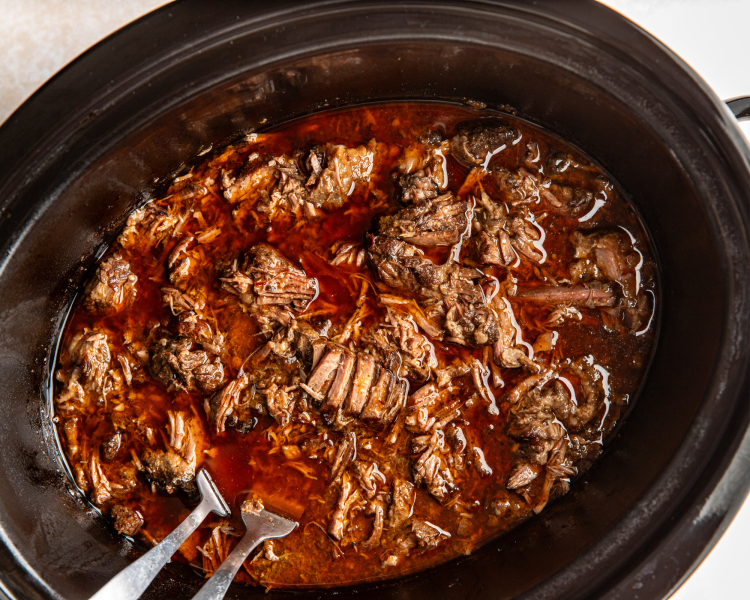 Shredded beef barbacoa in the crockpot.