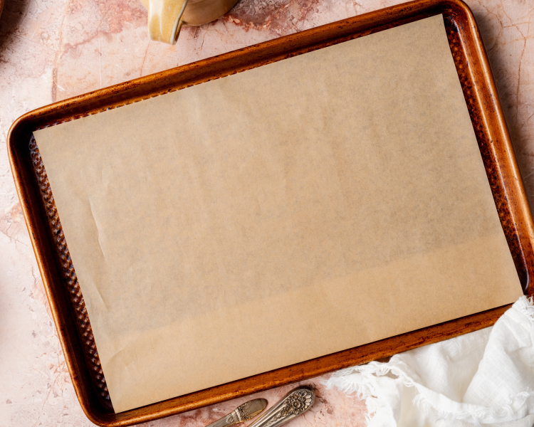 Rimmed baking sheet lined with parchment paper.