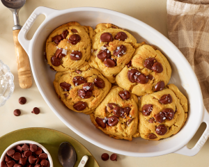 Six giant cookies baked together in a baking dish.