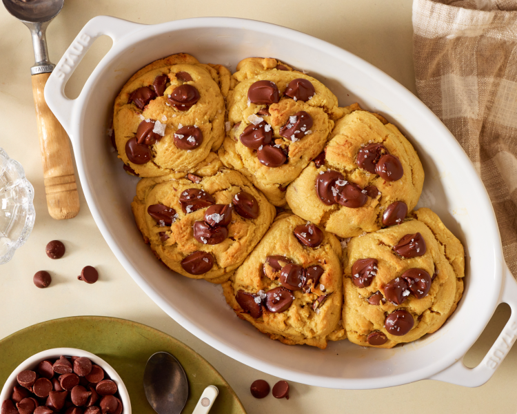 Six giant cookies baked together in a baking dish.