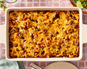 Enchilada casserole baked in 9x13 dish then broiled the last few minutes to get nice and bubbly.