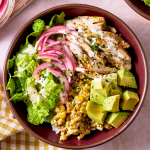 Street corn bowl assembled and topped with toppings.