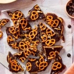 Pieces of date bark cut on a piece of parchment paper.