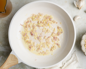 Cooking the shallot and garlic in butter and oil before adding the orzo.