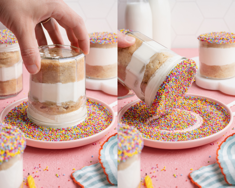 Decorating the top of the mug cake with rainbow nonpareil sprinkles.