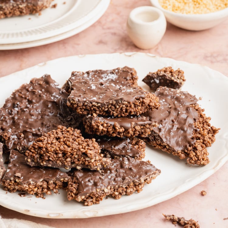 Broken quinoa bark on plate.