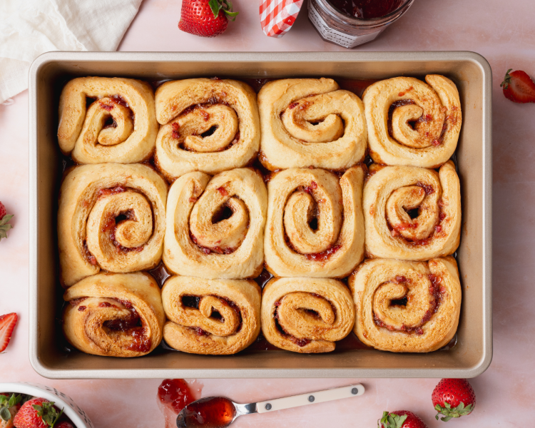 Strawberry cinnamon rolls baked in 9x13 pan.