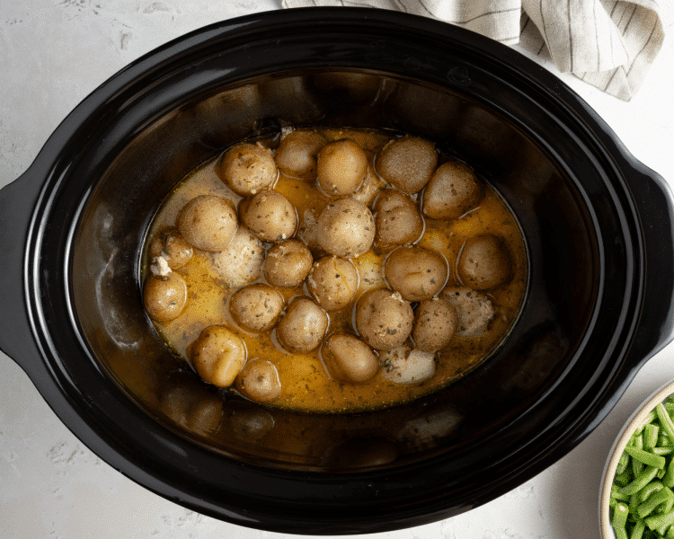 Chicken and potatoes cooked in slow cooker for 5-6 hours on low or 3-4 hours on high.