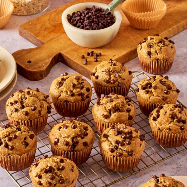 Blender banana muffins cooling on a wire rack.