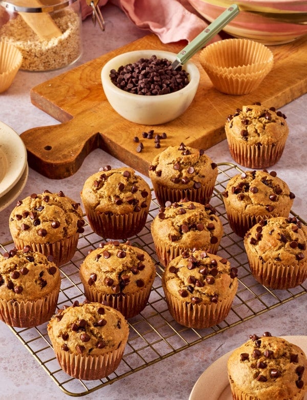 Blender banana muffins cooling on a wire rack.