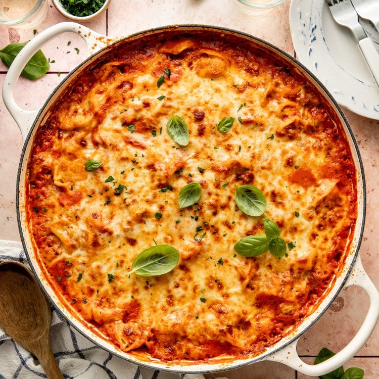 Cheesy ground beef tortellini bake cooked in large skillet.