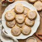Baked and iced pop tart cookies on large white plate.