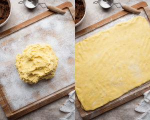Pressing the cinnamon roll cookie dough out into a 9x13 rectangle before adding the filling.