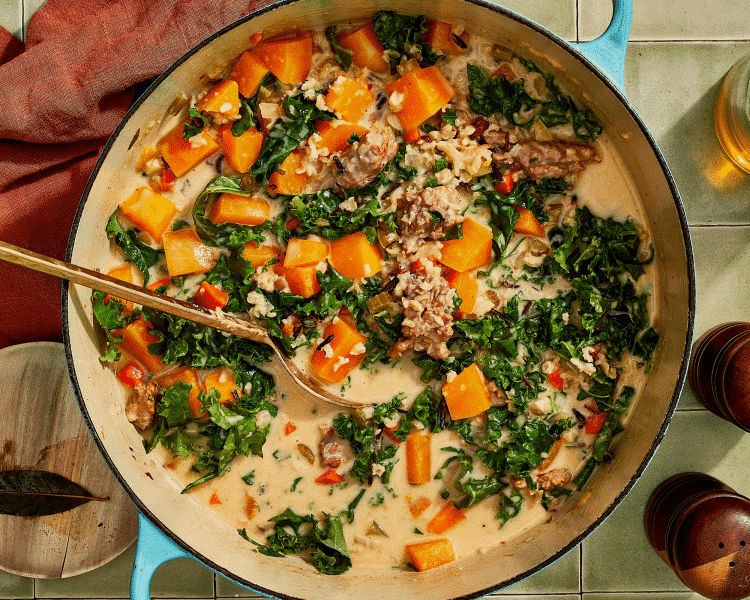 Kale added to harvest soup and stirred to let it wilt.