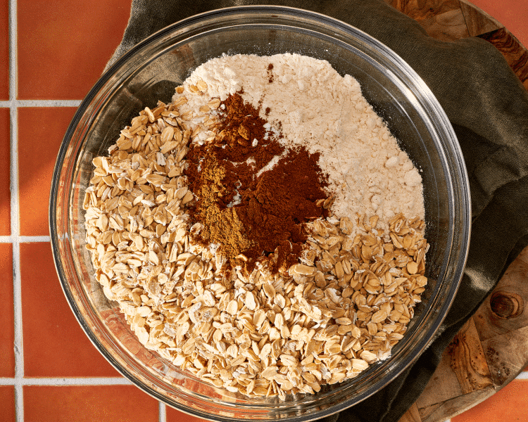 Whisking all the dry ingredients together in a mixing bowl.