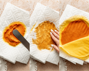 Three images of blotting the pumpkin in between paper towels to remove excess moisture.