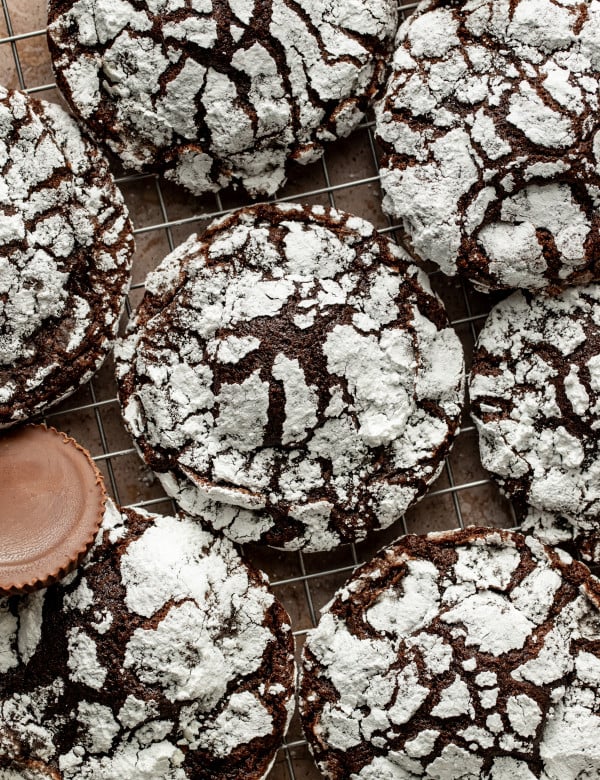 Reese's crinkle cookies on wire rack.