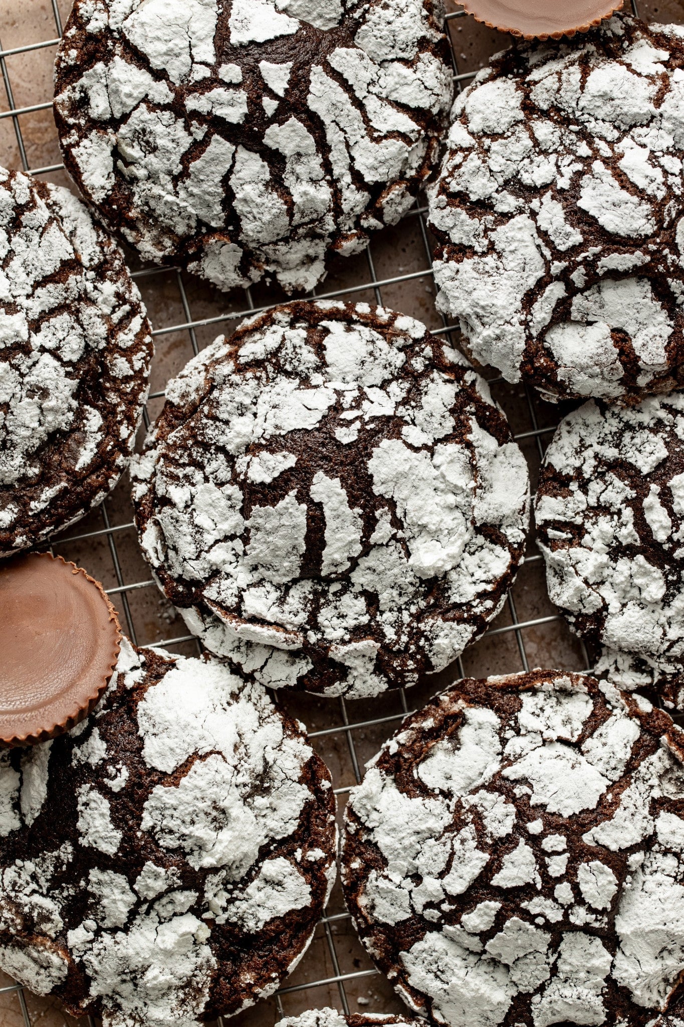 Reese's crinkle cookies on wire rack.