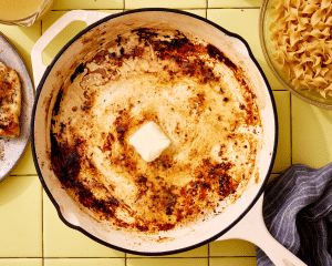 Melting the butter in a large skillet.