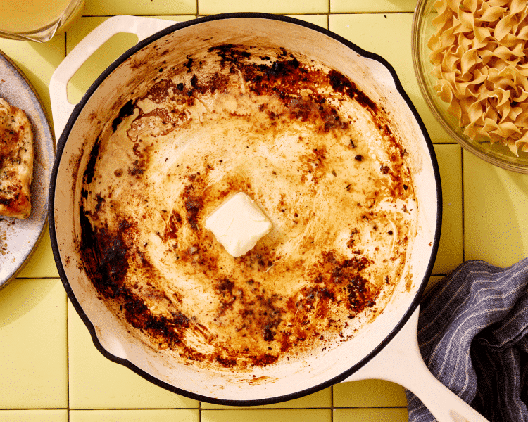 Melting the butter in a large skillet.